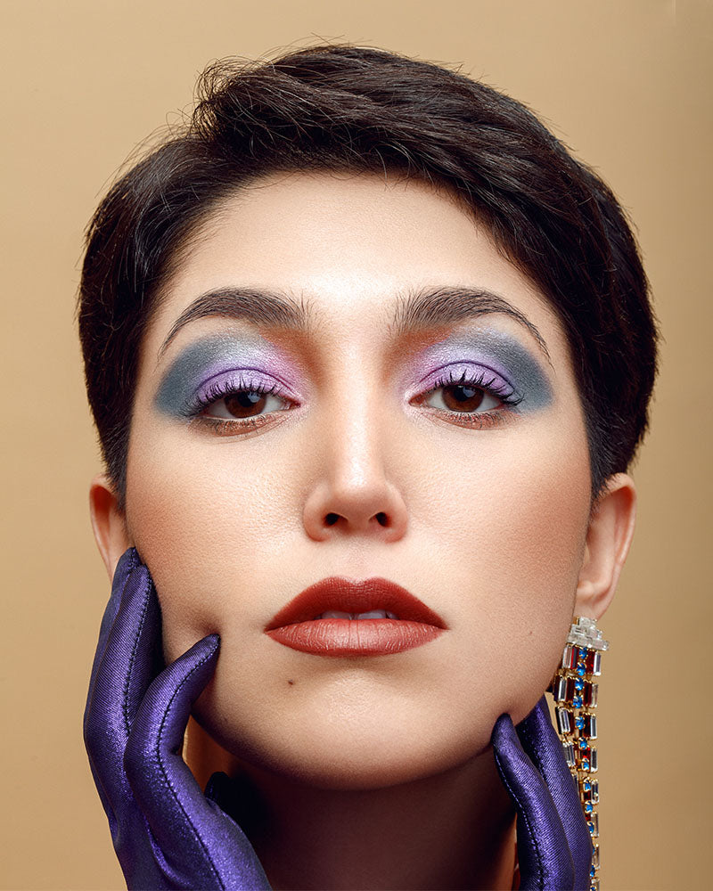 Reckless Cosmetics | Short haired Model wearing Reckless Cosmetics eye-luminate and lipt tints headshot